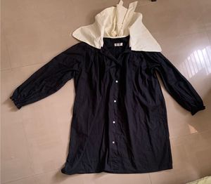 Avant-Garde Black Dress with White Collar