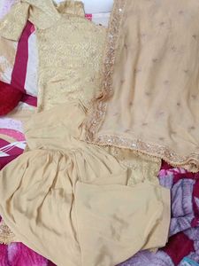 Elegant golden colour Indian suit