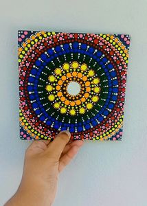 Its a handmade mandala art or dot art