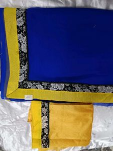 Elegant Blue Saree With Yellow Blouse