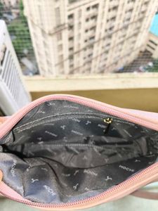 Pink Mochi Sling Bag With Quilted Front And Solid