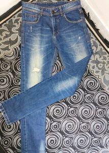 Distressed Denim Jeans