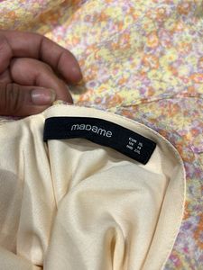 Madame Top