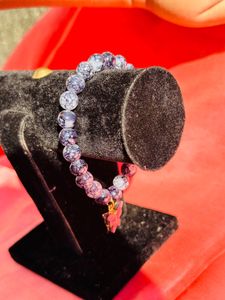 Black Printed Beads Bracelet With Hanging Charm.