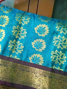 Sky Blue Silk Saree with Gold Border