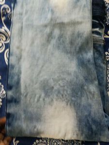 Distressed Blue Denim Jeans