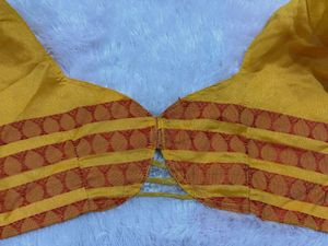 Mango Yellow With Red Colour Stitched Blouse