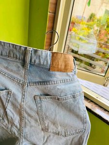 H&amp;M light blue washed ripped shorts