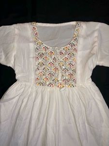 Elegant White Dress with Floral Embroidery
