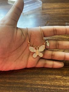 Rose Gold Butterfly Pendent With Chain And Rose Gold Heart Rythm Pendent With Chain
