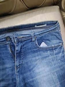 Distressed Denim Jeans