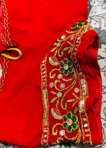 Green Embroidered Saree with red contrast blouse