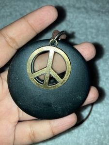 Peace symbol locket