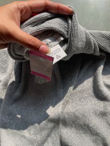 Silver Shrug
