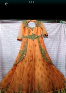 A Beautiful Party Wear Oranga Gown