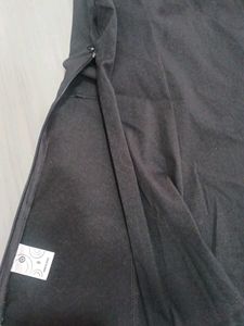 Black Sleeveless Surplice Top