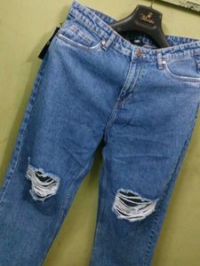 Ripped Knee Denim Jeans