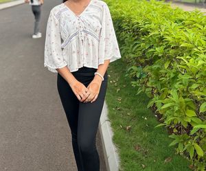 white stylish top with front slit