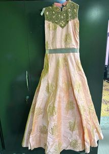 Elegant Peach And Golden Gown
