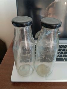 Two Clear Glass Bottles