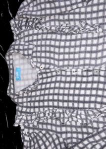 An Crop shirt. It's Colour Is Dull Grey