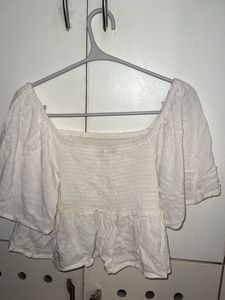 Cream Smocked Peplum Top