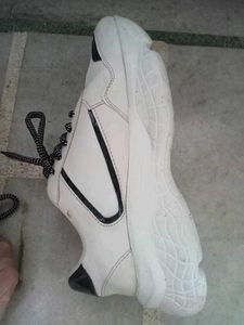 white and black women&#39;s sneakers