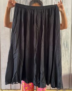 Black Skirt With Beads And Cut Out At Bottom