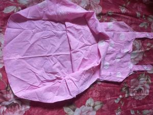 Pink Sundress with White Dot Pattern.
