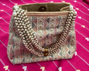 Graceful Ethnic Clutch With Embroidery