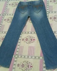 Embroidered Pocket Flare Jeans