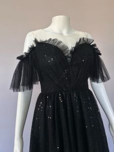 Black sequined Lux gown