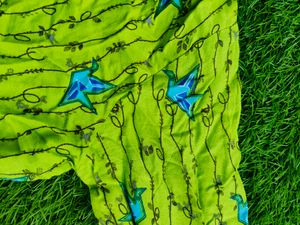 Flourescent green 💚 tunic with blue origami birds
