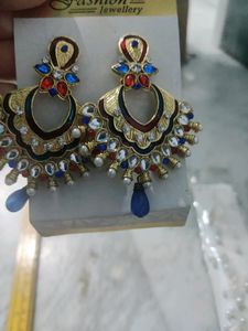 blue red stone on golden pleated earring