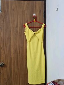 Yellow Sleeveless Dress with Open Back