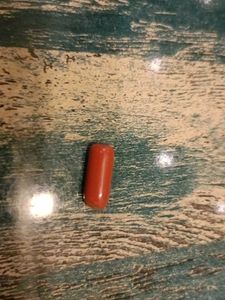 Red Bullet-Shaped Trinket