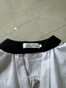 Sleeveless White Top