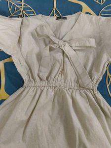 Beige Tie-Front Blouse with Bell Sleeves