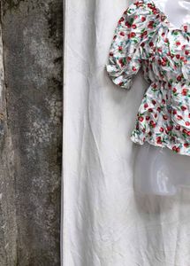 I. Strawberry Print Peplum Top