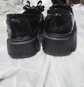 Black Loafers with Bow Detail