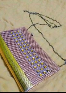 Elegant Gold Clutch with Chain