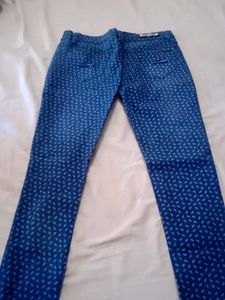 Ripped Patterned Jeans