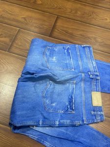 Distressed Denim Jeans