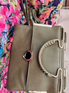 Elegant Clutch with Unique Handle