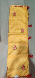 musk melon colour traditional saree with latkans and butas comes with red blouse