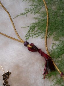 Neckpiece And Earpiece