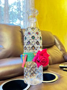 Crystallized designer plastic bottle