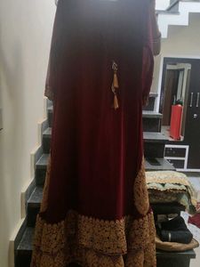 Elegant Maroon Embroidered Saree