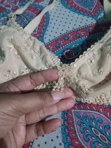 7 Vintage Eyelet Bras - Size 34B