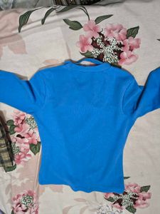 Blue  top used just twice busy 28/30 fitted